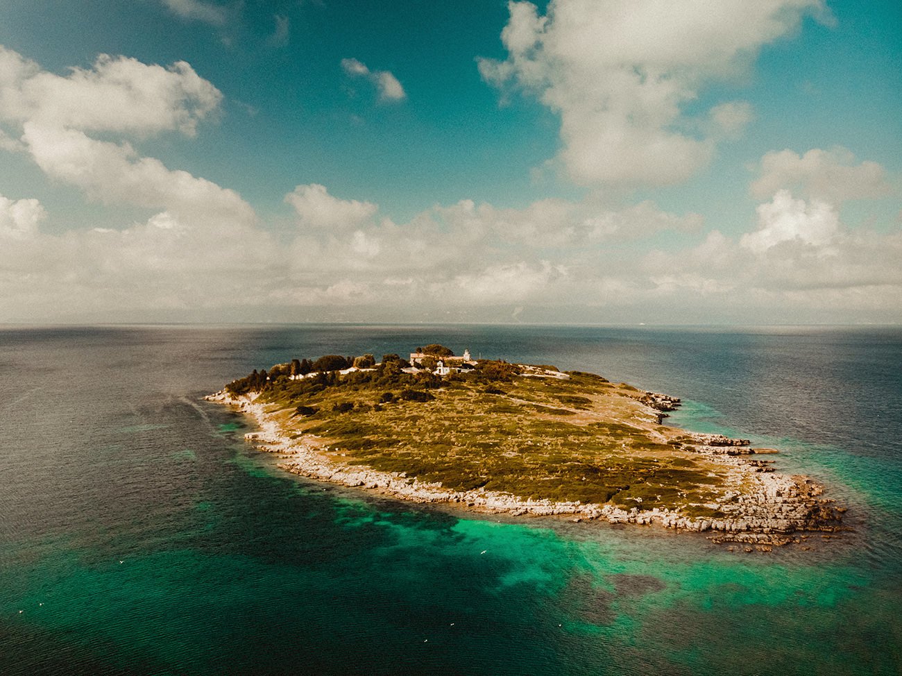 Breathtaking aerial view of the Panaghitsa islet in Paxos