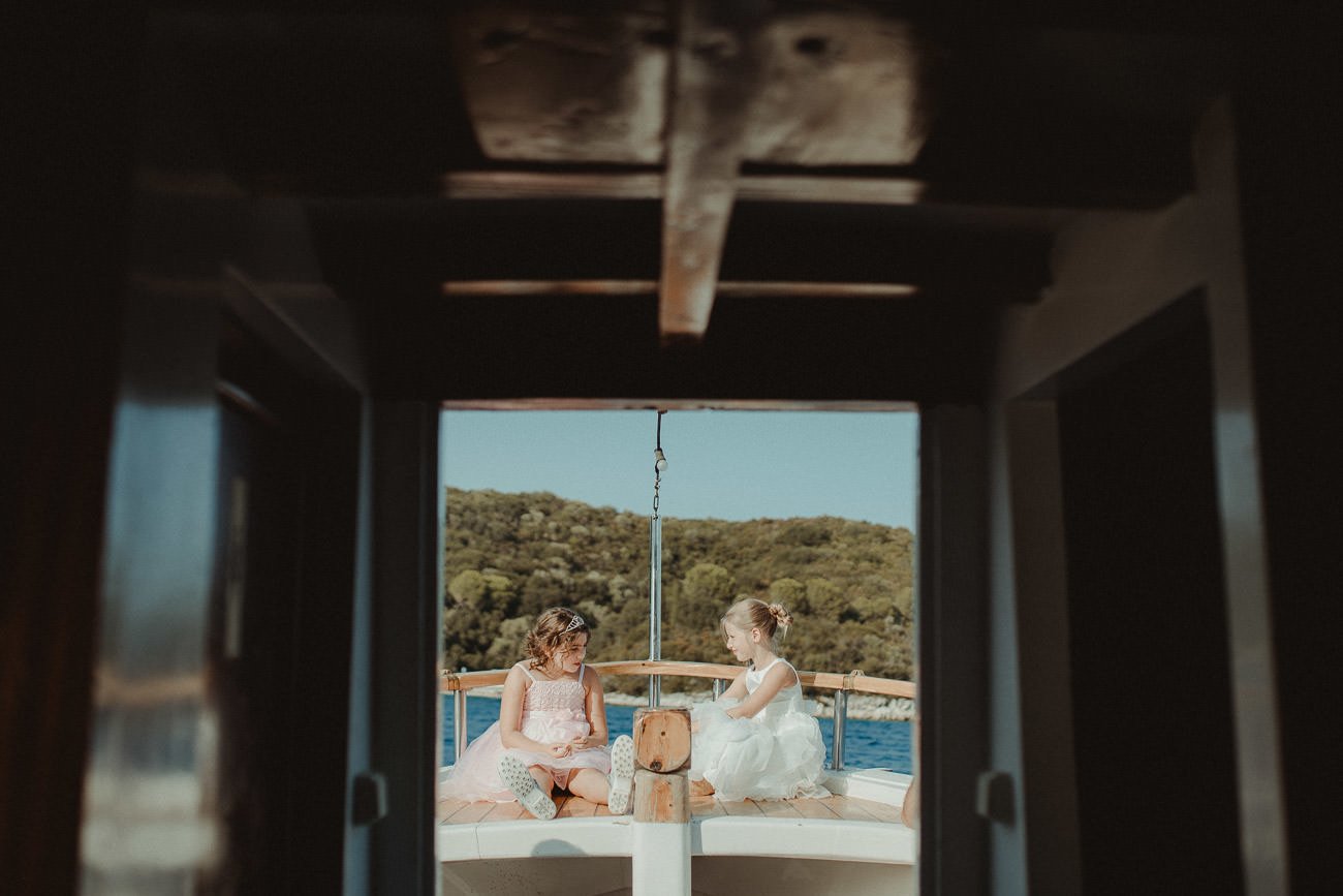 Young bridesmaids in Lefkada sailing after wedding