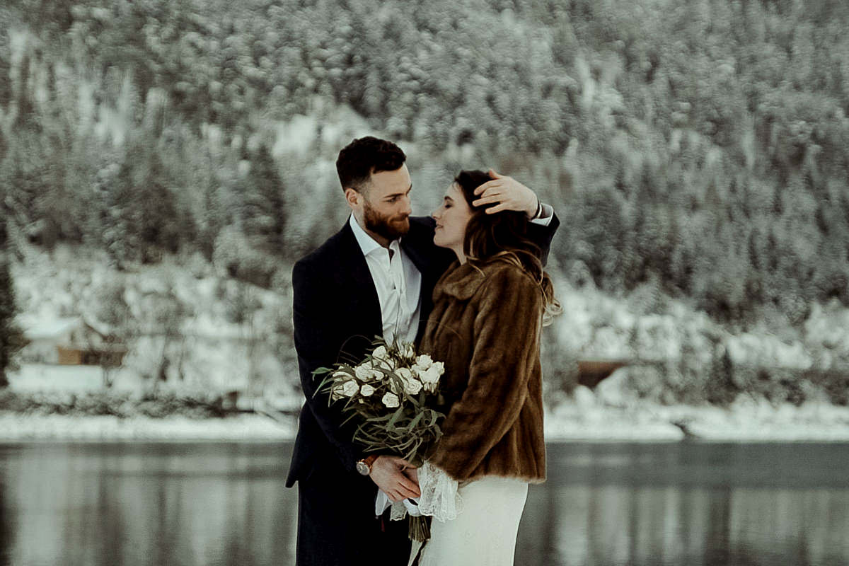 Austrian Alps wedding videographer filming winter elopement in Lake Achensee Tirol