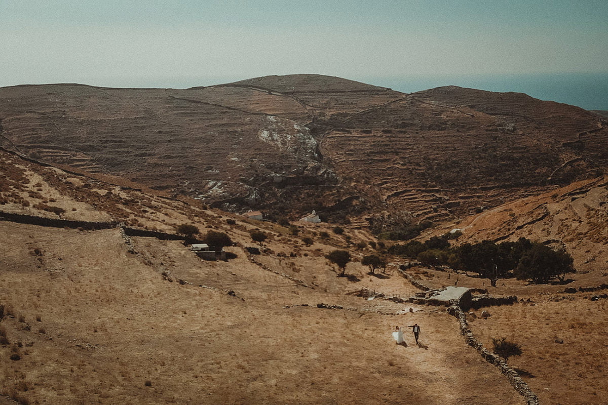 Kythnos Wedding Videographer shooting a beautiful image of the couple