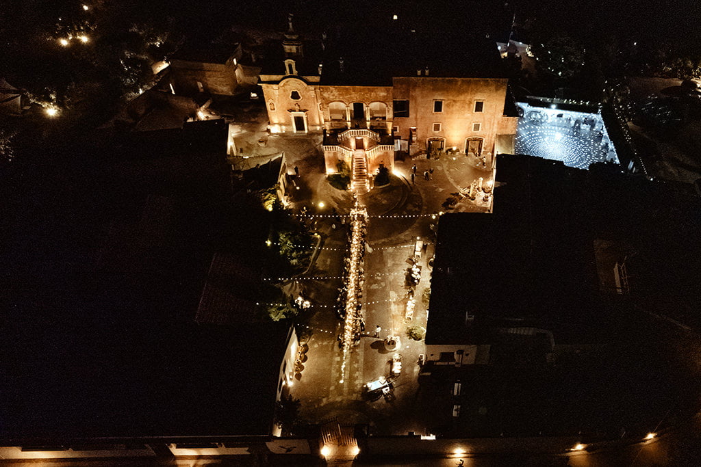 Masseria Spina Wedding dinner table aerial filming by Videographer Cinema of Poetry