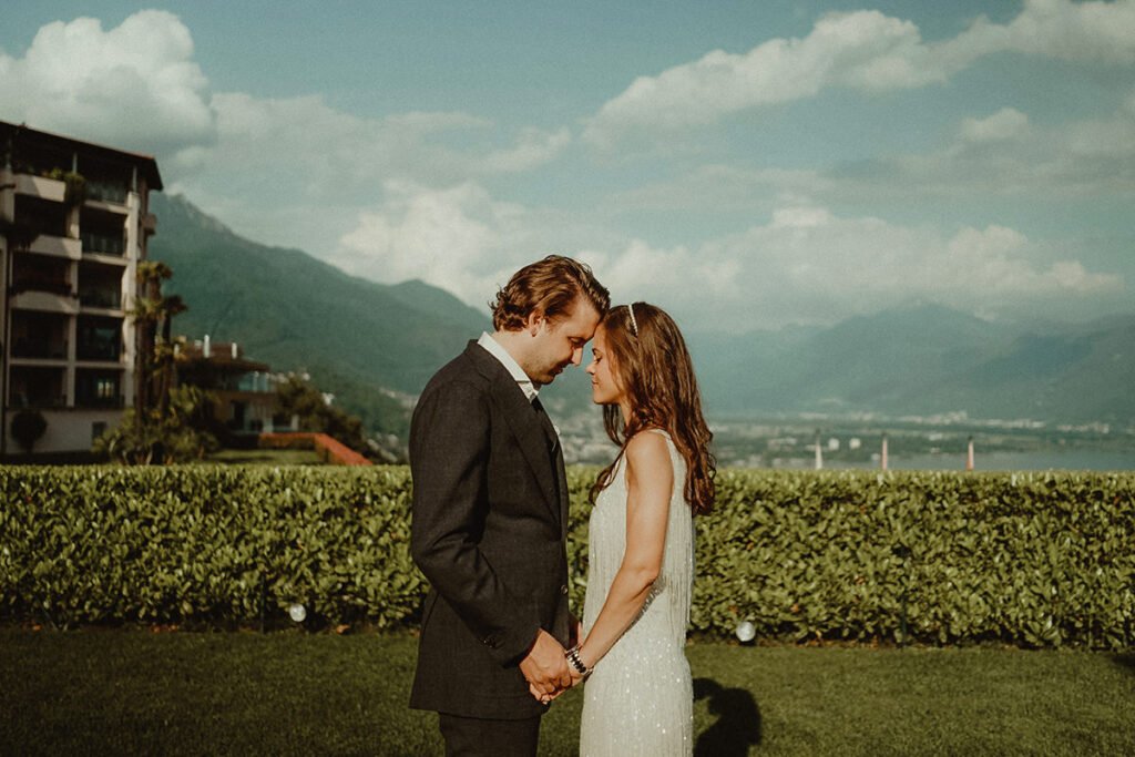 wedding in Villa Orselina, couple in front of the lake maggiore in Locarno Switzerland