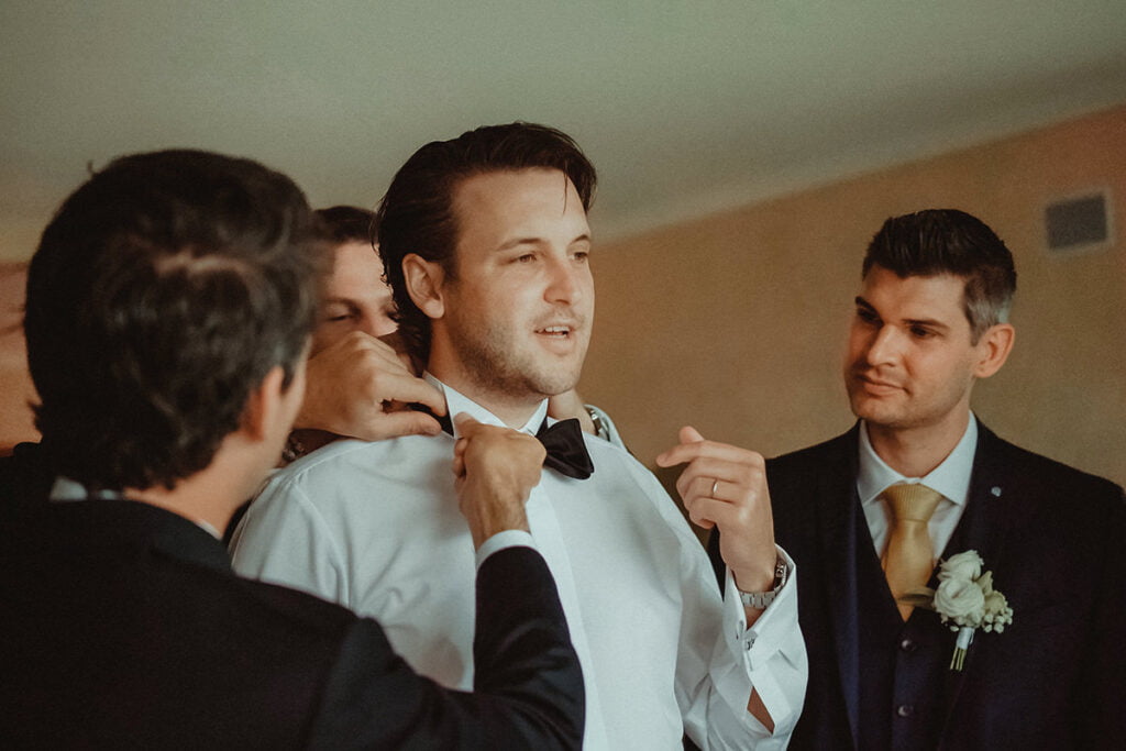 Groom getting ready in Villa Orselina for his destination wedding in Ticino