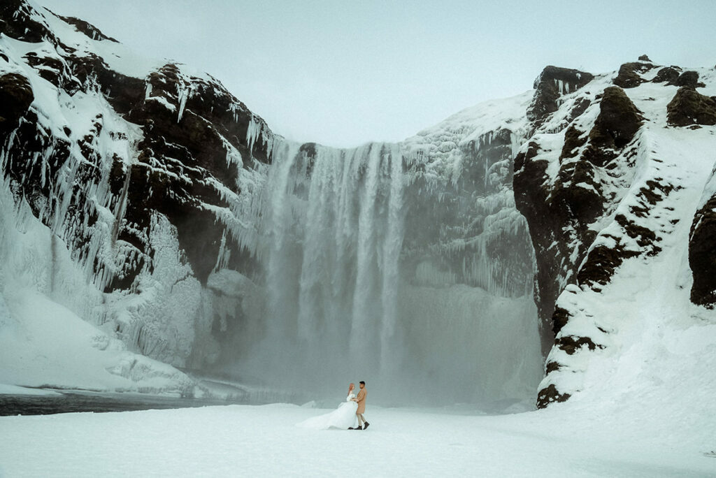 wedding couple hugging in a snowy winter landscape in Iceland