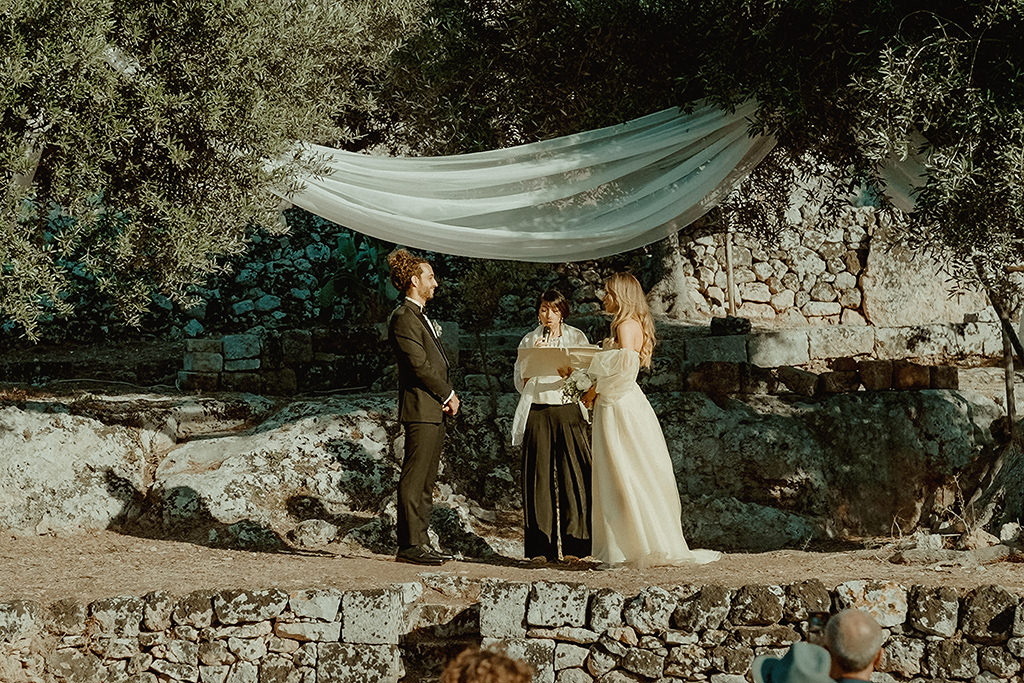 Intimate outdoors wedding ceremony in Puglia Italy