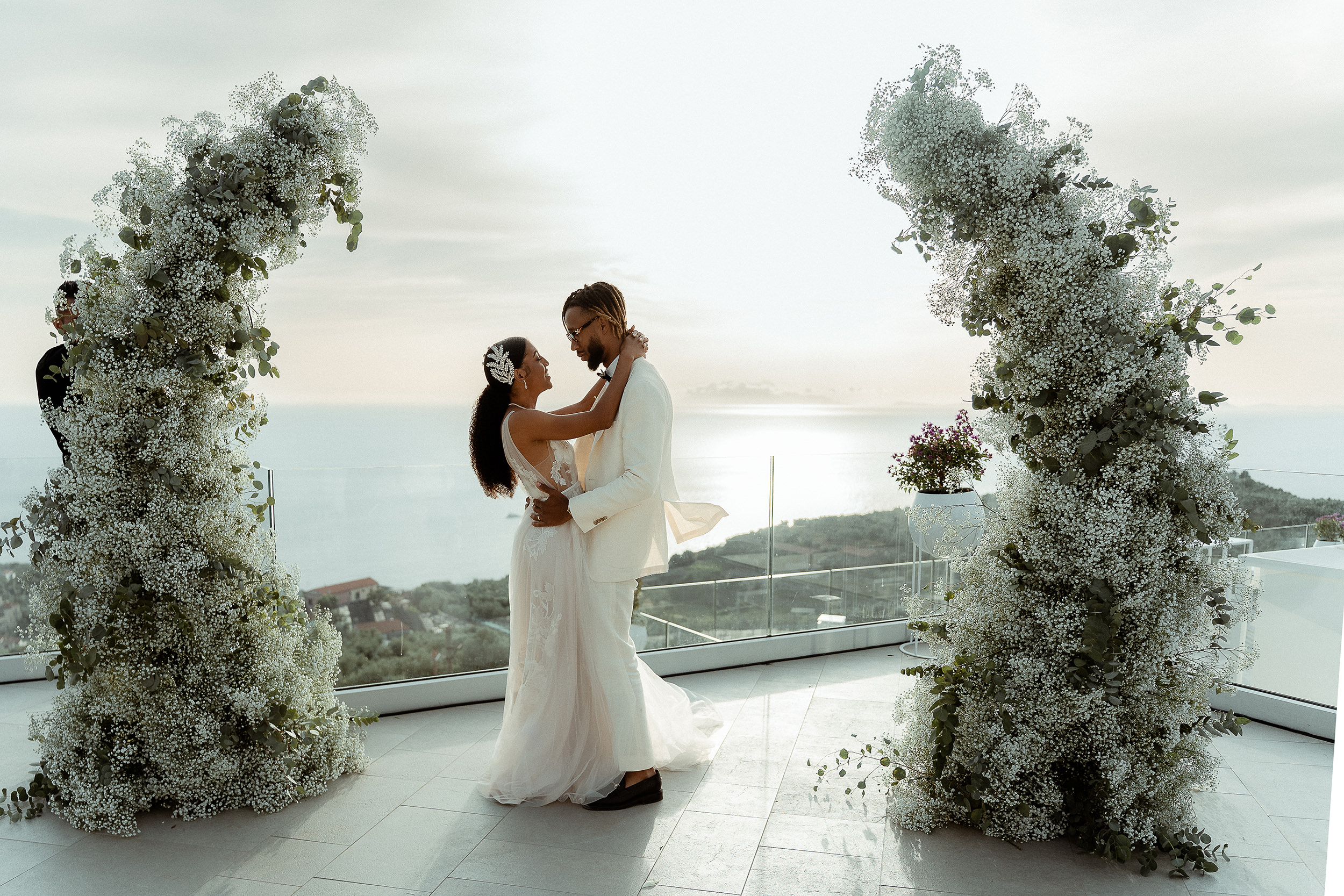 Couple hugging after their destination wedding ceremony in the Amalfi Coast Italy