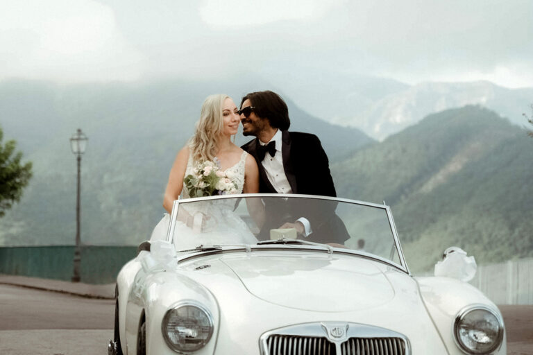 Intimate Wedding in Ravello Villa La Rondinaia - Duomo di Amalfi Italy 7 wedding couple on a vintage car in Ravello filmed by wedding videographer Cinema of Poetry