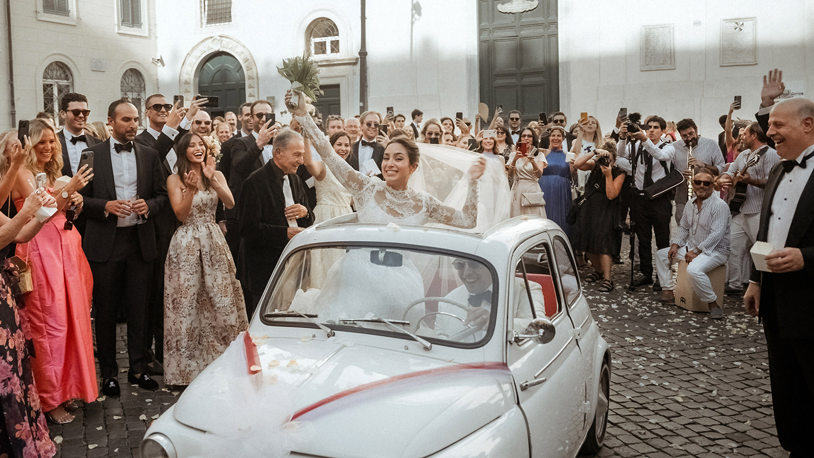 Luxury Destination Wedding in Rome Spectacular couple exit on a Fiat 500