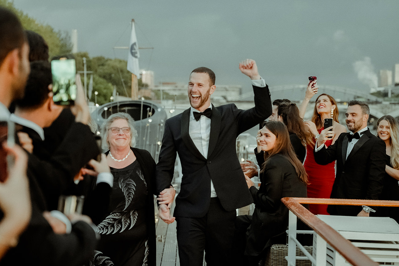 Outdoor wedding ceremony aboard L'Excellence on the Seine in Paris