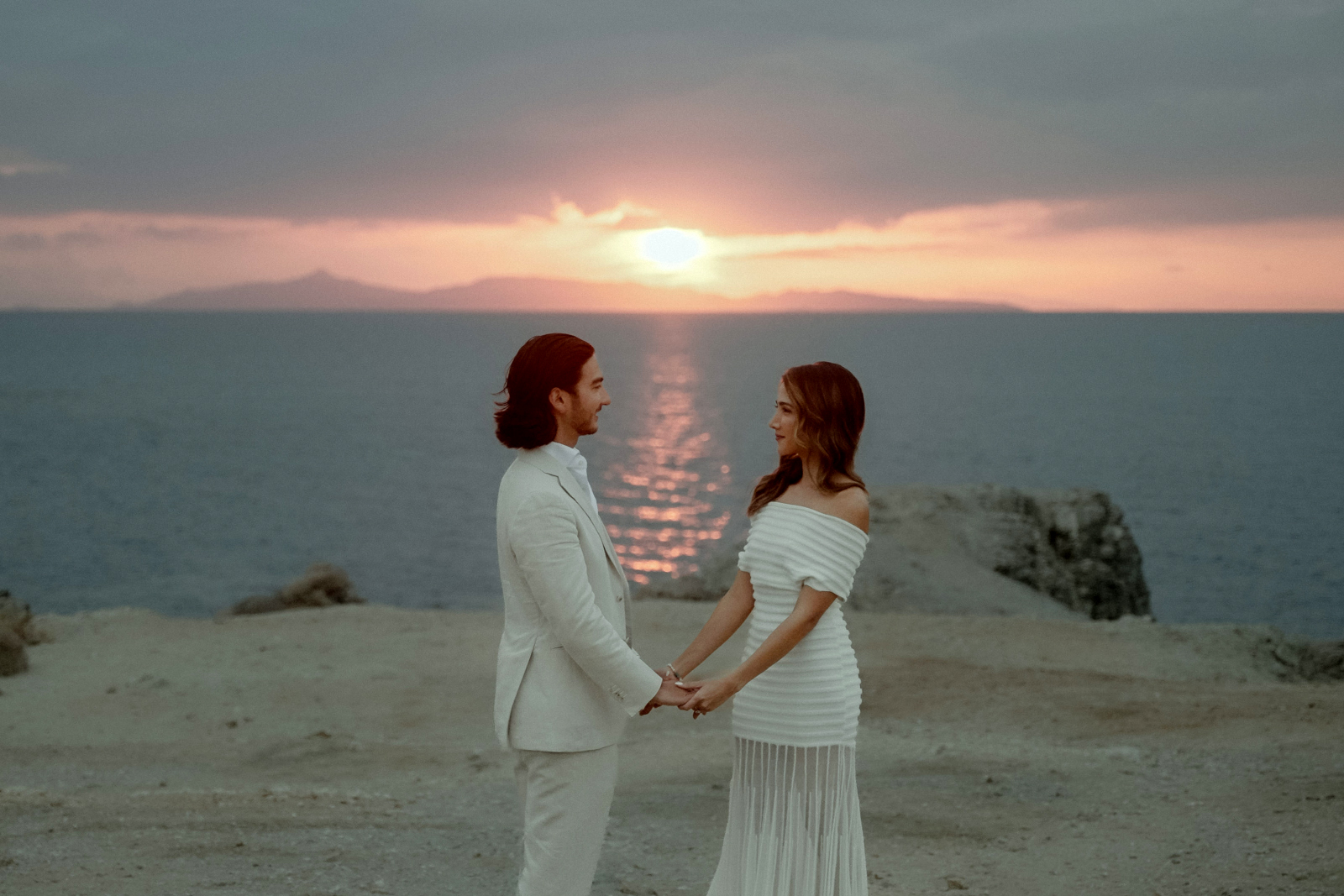 Couple in the Athens Riviera at Sunset filmed by an Athens Wedding Videographer