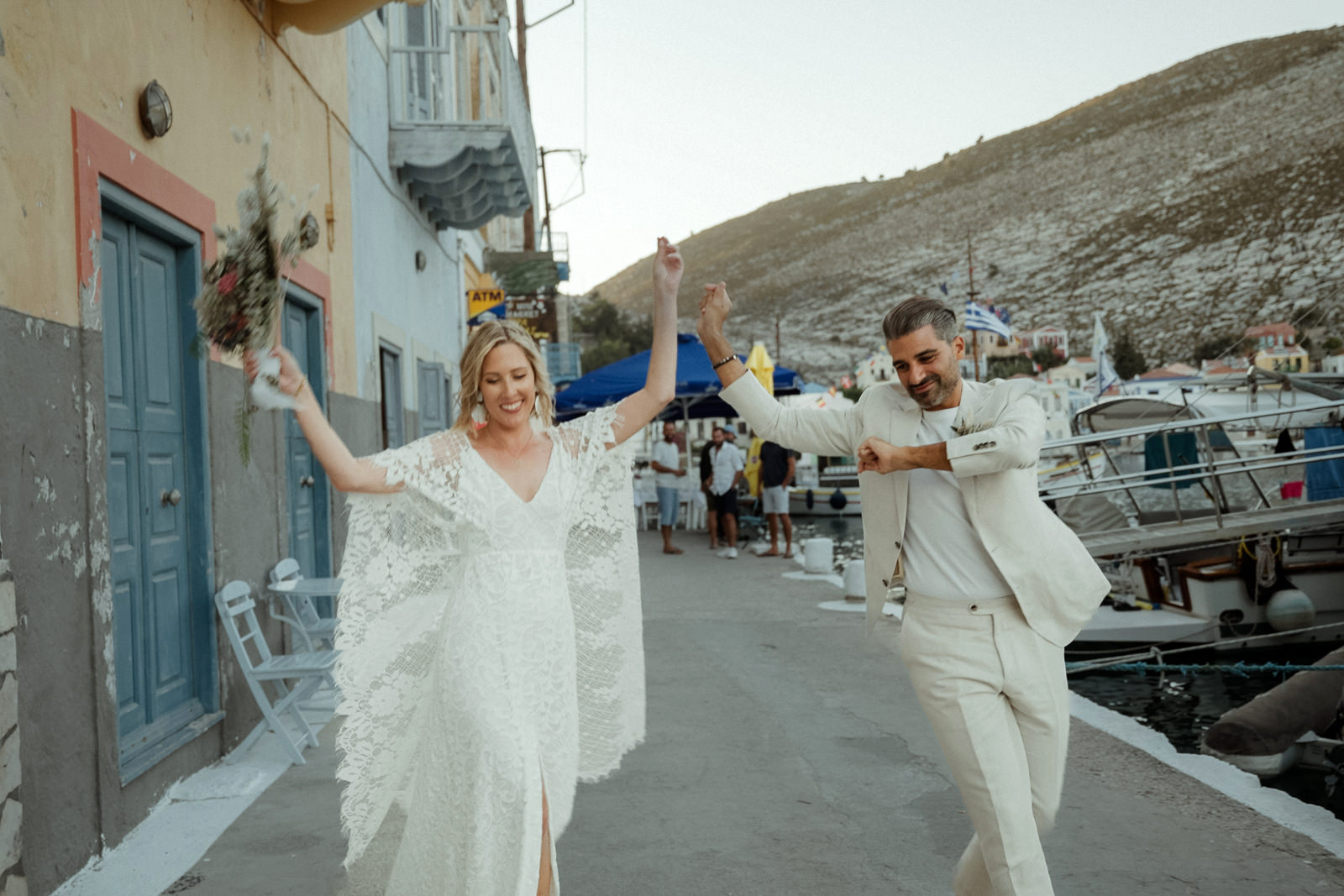 Couple dancing syrtaki after their Kastellorizo Destination Wedding