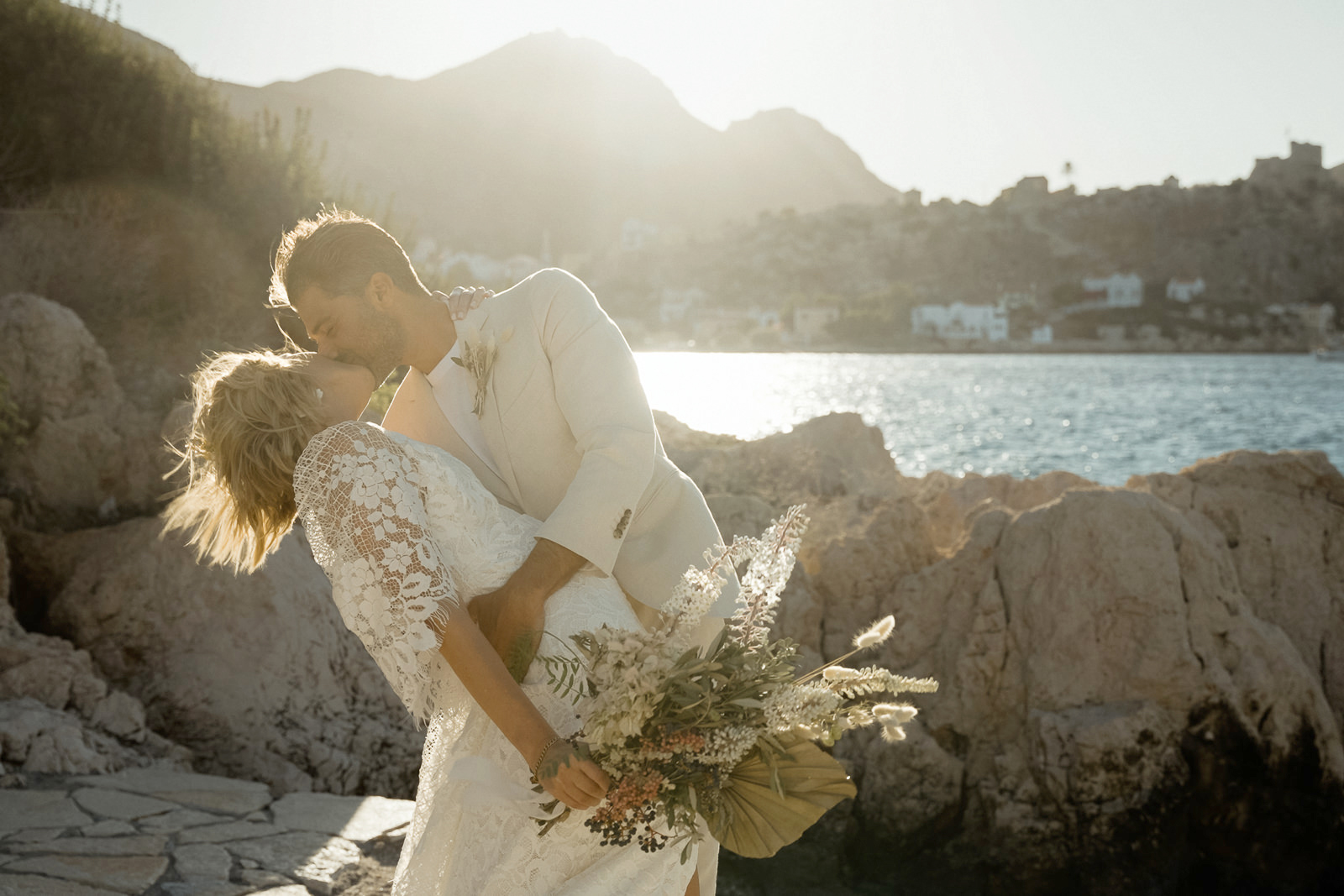 Couple kissing before sunset after their Kastellorizo Destination Wedding in Greece