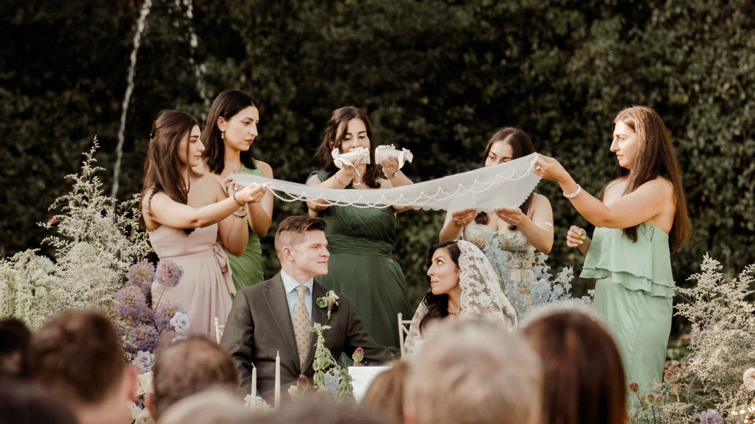 Couple Exit from a Persian Sofreh Aghd Wedding at Villa Grabau in Tuscany Rubbing sugar cones