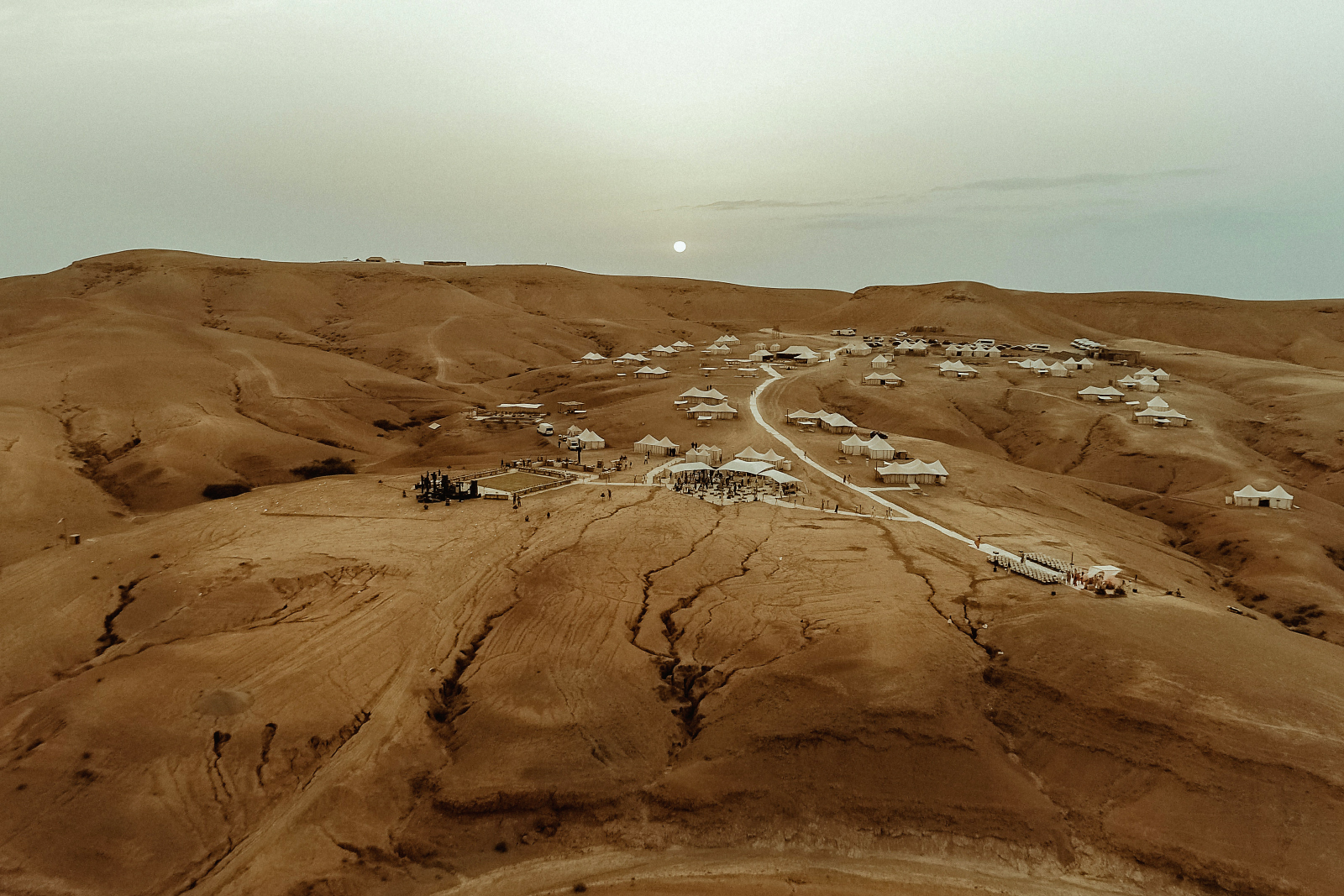 Aerial view of the Scarabeo Camp in Agafay in the framework of a Marrakech Jewish Wedding Ceremony at sunset