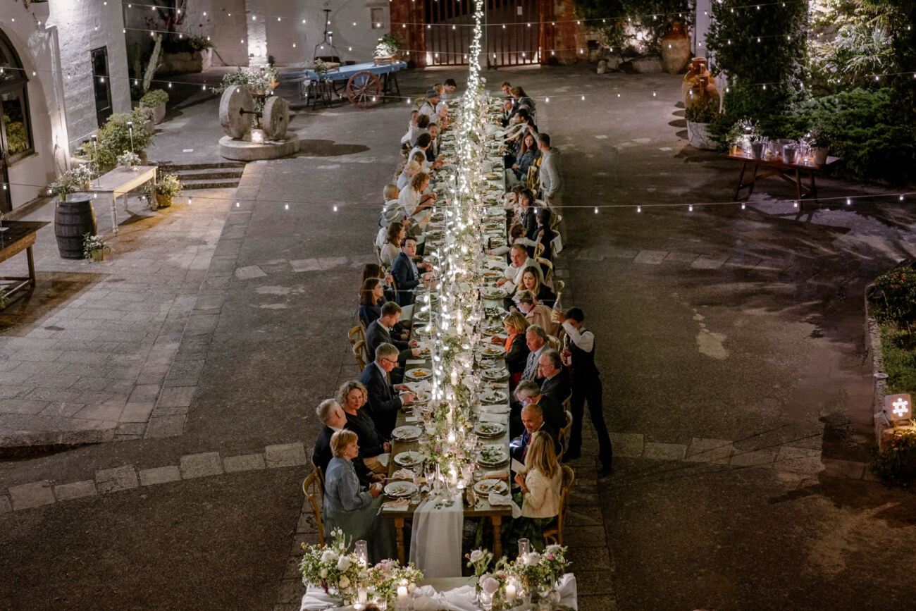 wedding reception in Puglia Italy with a unique long table for all the guests