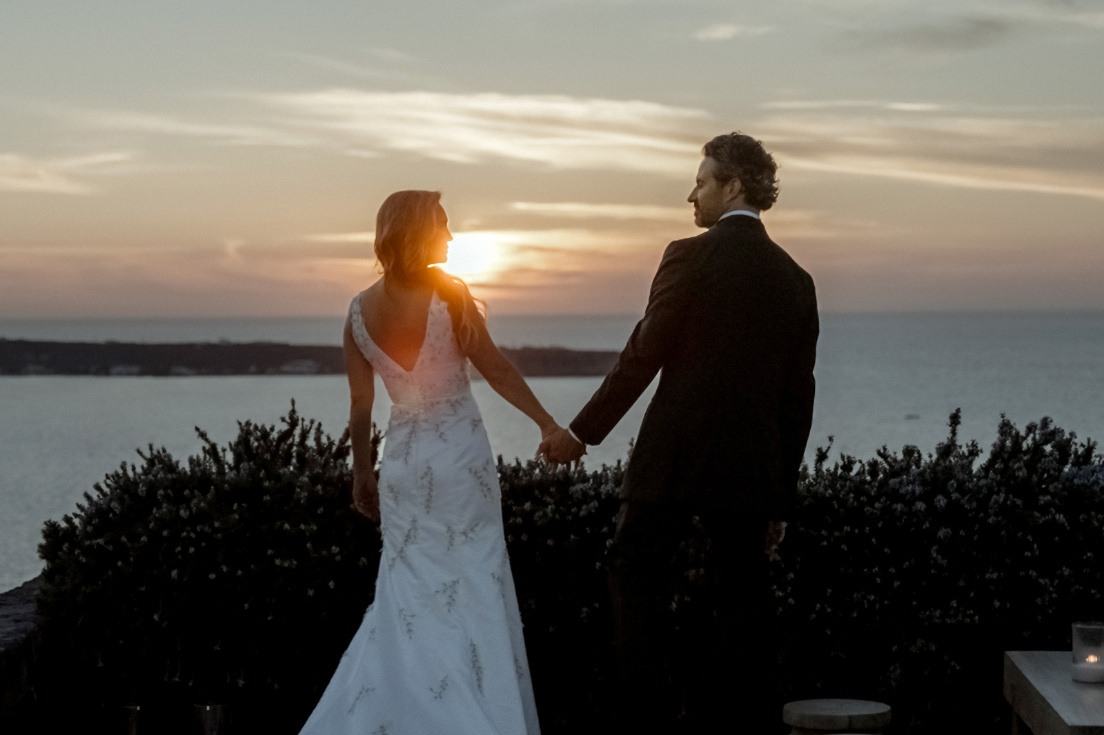 Bride and groom at the Canaves Epitome Santorini overlooking the Aegean Sea