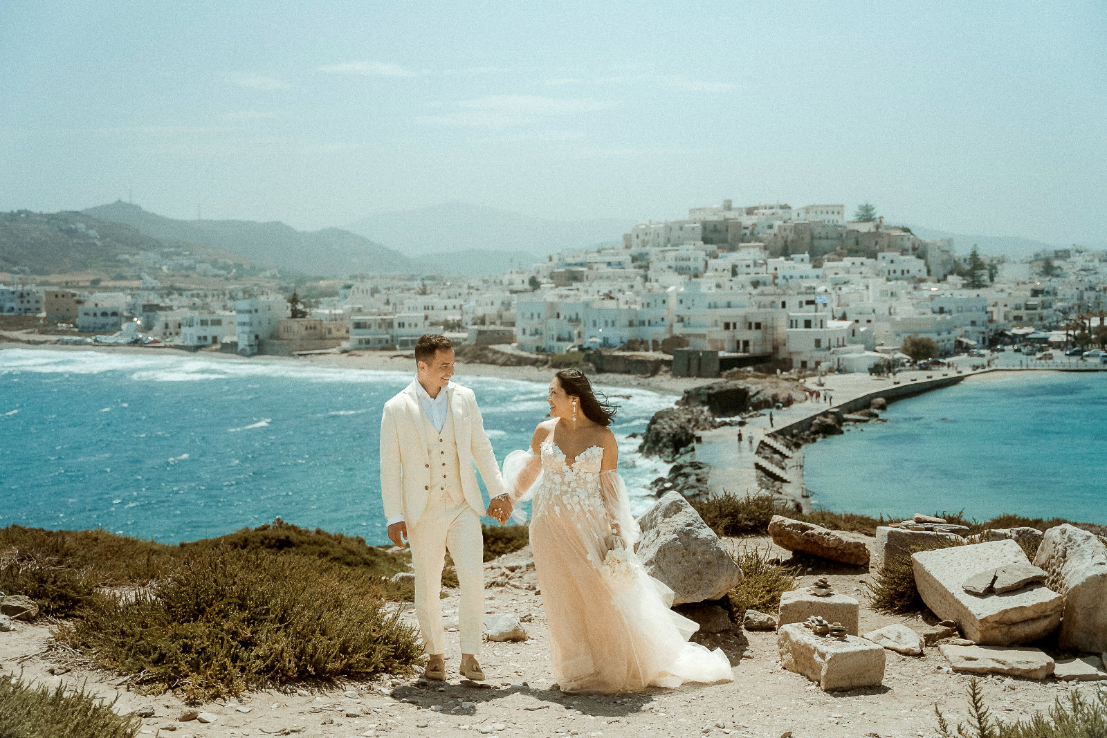 How to choose a Wedding videographer in Greece to film your destination wedding - filming a couple in Naxos