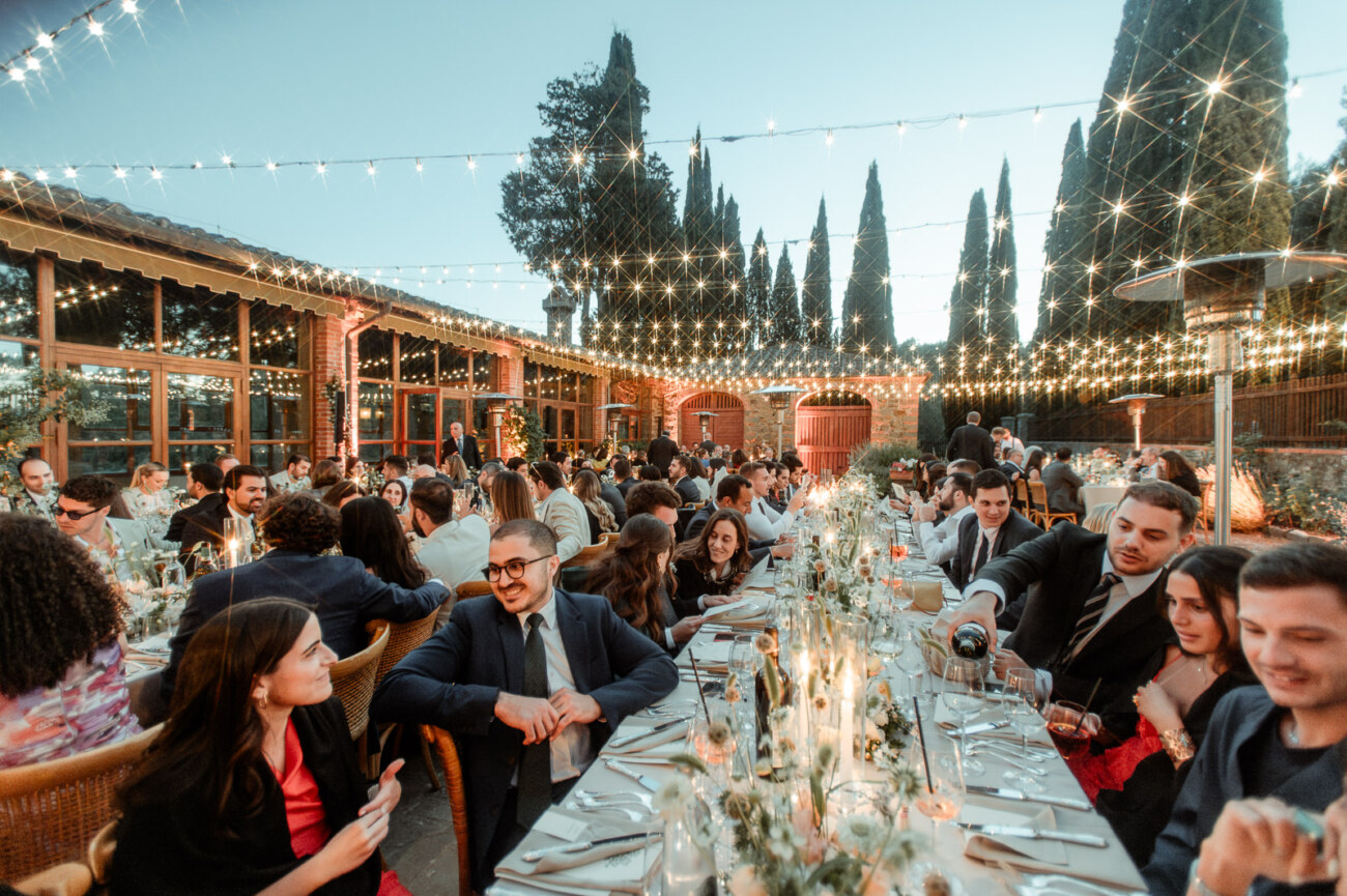 Destination wedding budget in Europe for a Tuscany estate dinner with guests and lighting