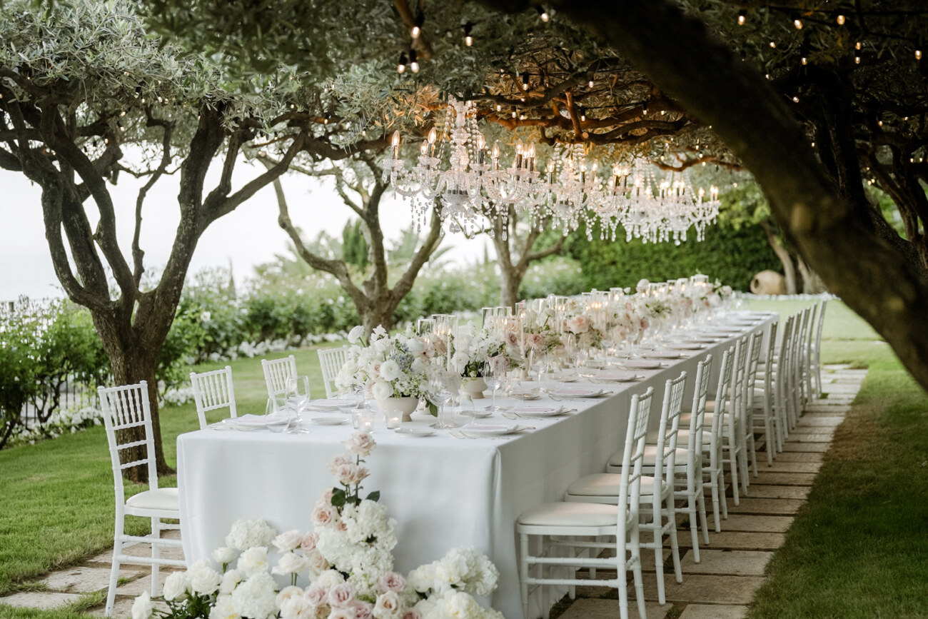 Dinner table setup in gli Ulivi garden for a Belmond Caruso Wedding in Ravello